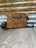 Tooled to Strap Clutch